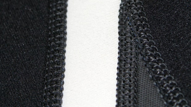 neoprene-panels-on-a-shorty-wetsuit-stitched-together