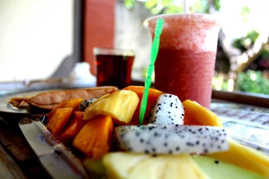 Bali breakfast: tea, banana jaffle, fruit salad, juice