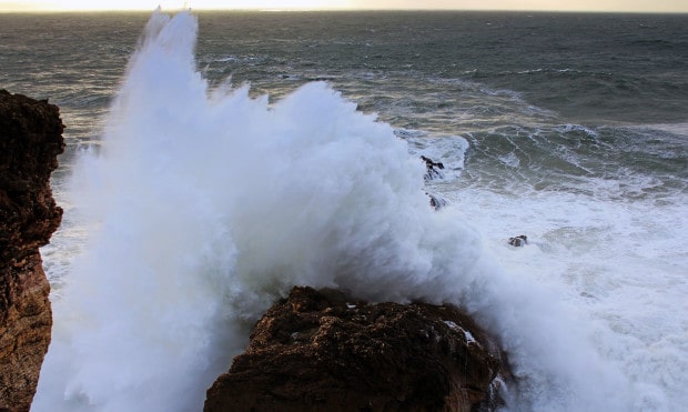 Ocean spray off the rock.