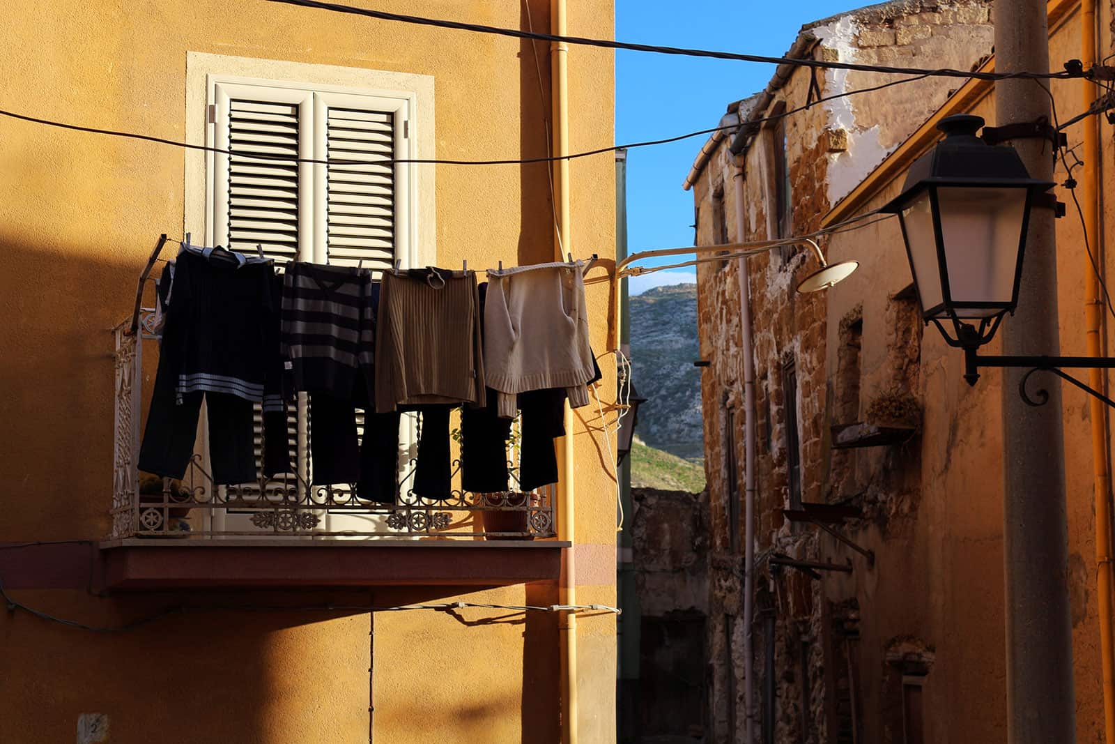 Clothes drying over the narrow street in Siculiana.