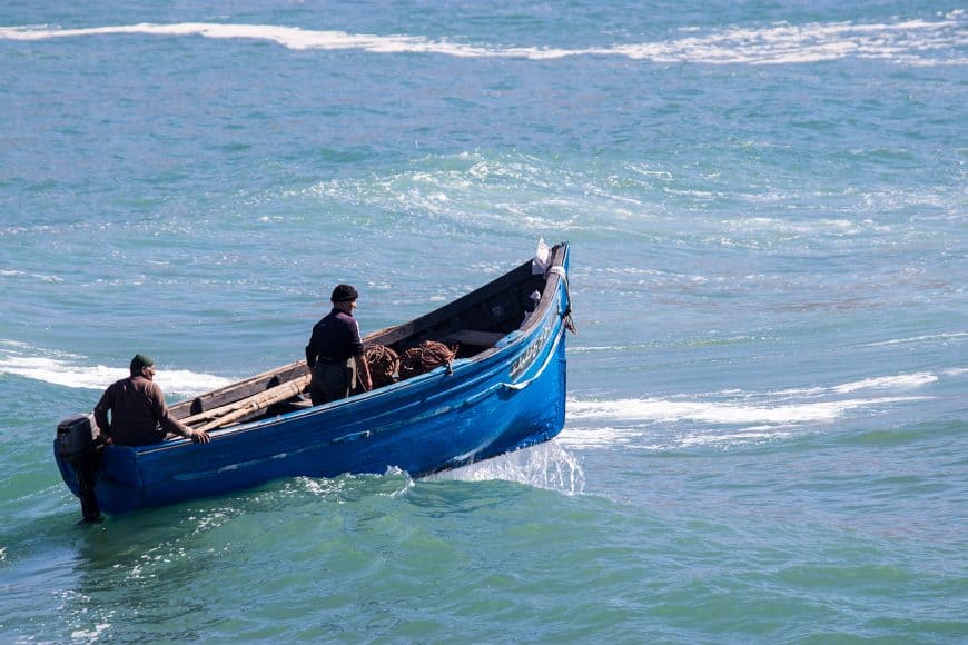 The classic Moroccan fishing boat shape and color. This boat can survive a slam into the concrete pier, no problem :)