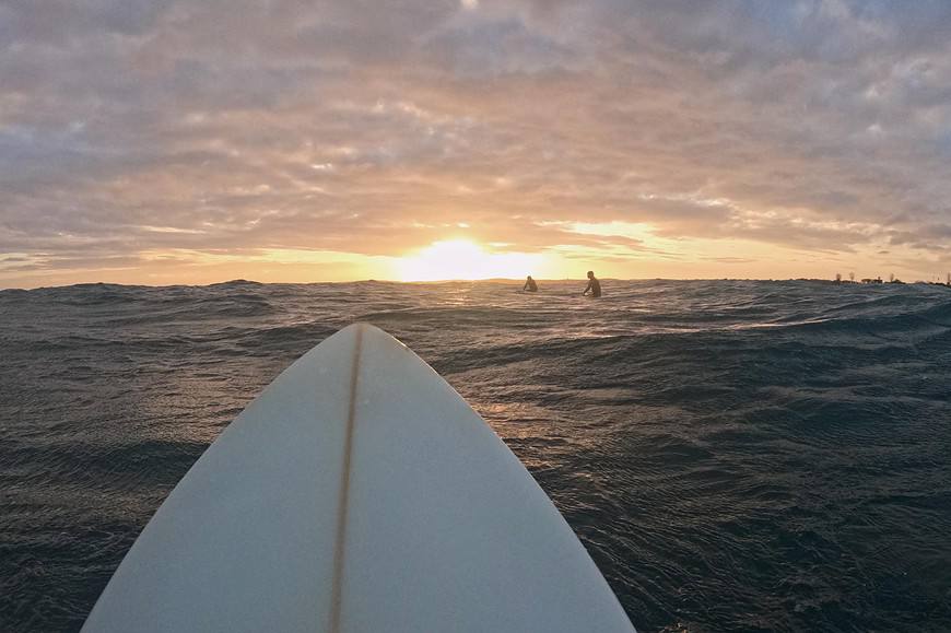 Sunset session. Sunny days in the water always add a point to the surf score.