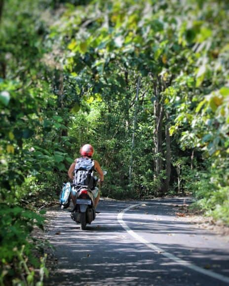 Trying to make a few shots with a scooter and the DryTide backpack while still in Bali and not getting eaten alive by mosquitoes on this stretch of road :)